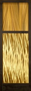 Slate artwork made from wood, metal, and glass