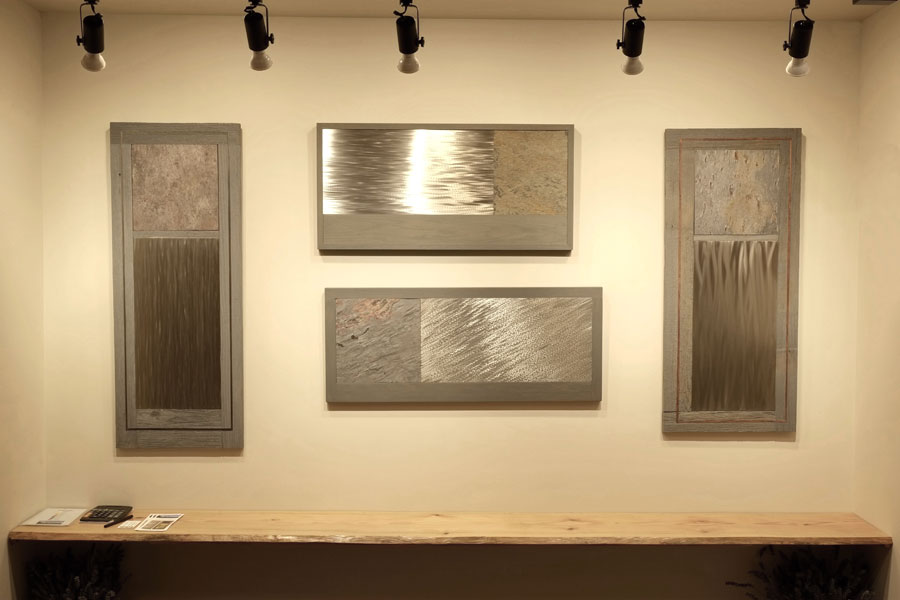 Slate artwork made from wood, metal, and glass