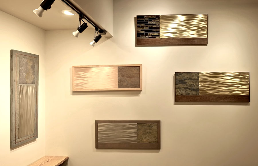 Slate artwork made from wood, metal, and glass